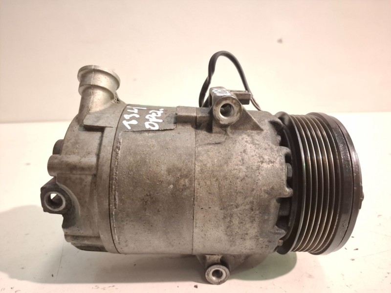 Recambio de compresor aire acondicionado para opel astra h gtc z17dth referencia OEM IAM 13124751  