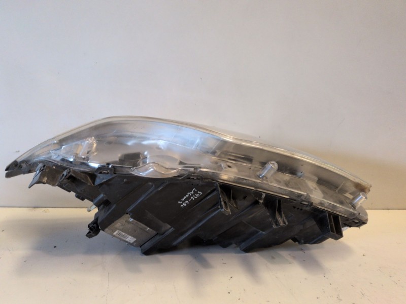 Recambio de faro derecho para renault laguna iii berlina m9r742 referencia OEM IAM 260100035R  