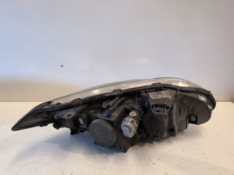 Recambio de faro izquierdo para renault laguna iii berlina m9r742 referencia OEM IAM 260600035R  