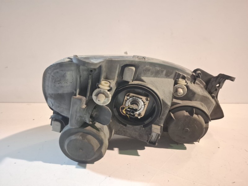 Recambio de faro izquierdo para opel combo (corsa c) z13dt referencia OEM IAM 13195923C  