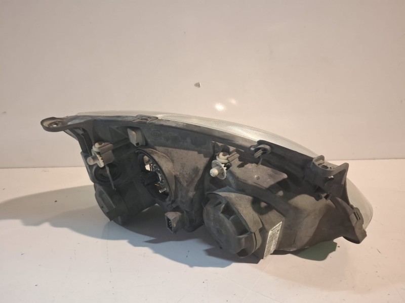 Recambio de faro izquierdo para opel combo (corsa c) z13dt referencia OEM IAM 13195923C  