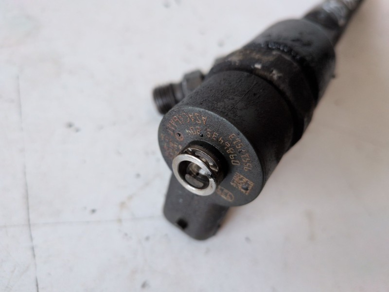 Recambio de inyector para opel combo d 263a2000 referencia OEM IAM 0445110351  