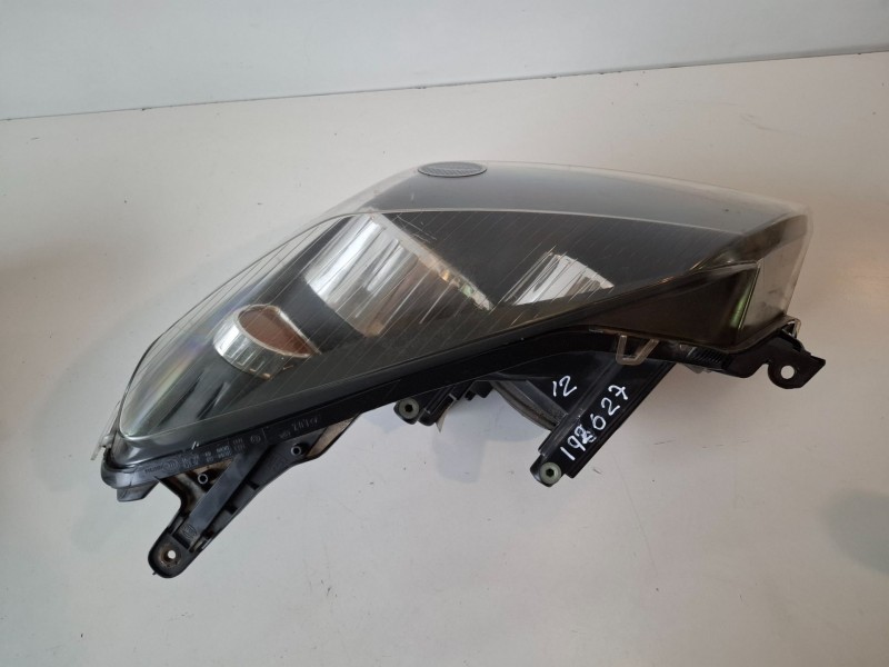 Recambio de faro izquierdo para opel astra h caravan z14xep referencia OEM IAM 1LG27037003  
