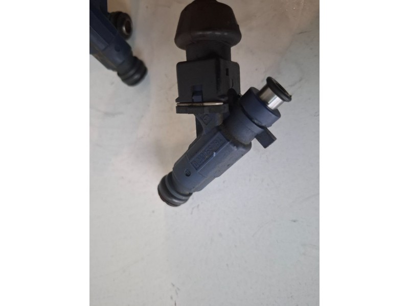 Recambio de inyector para peugeot 206 nfz referencia OEM IAM 0280155794  