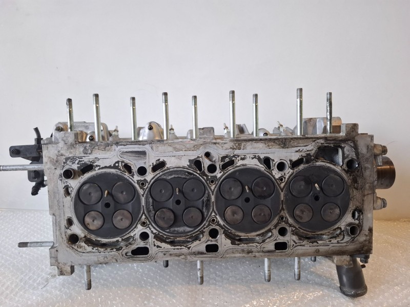 Recambio de culata para opel astra j berlina 5p a20dth referencia OEM IAM 55571949  