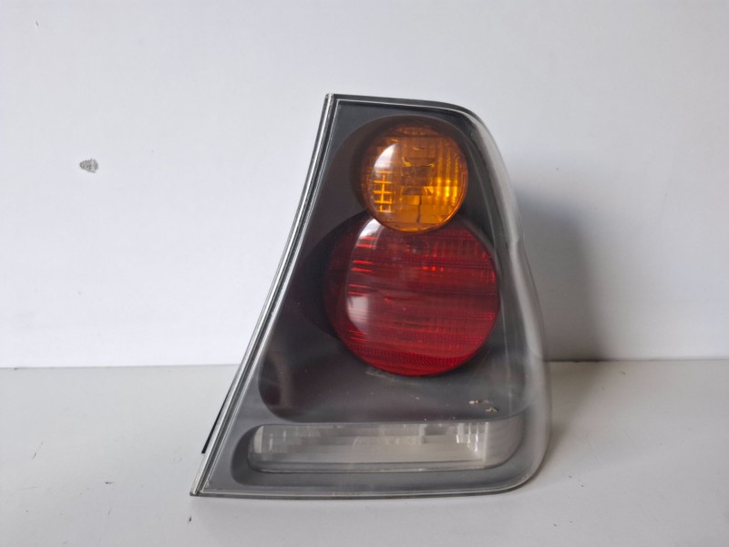 Recambio de piloto trasero derecho para bmw serie 3 compacto (e46) n42b18a referencia OEM IAM 63216  