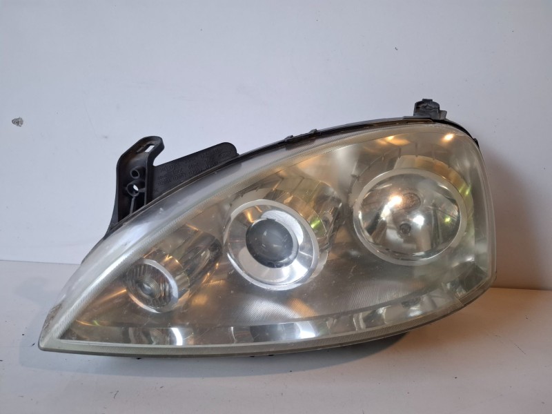 Recambio de faro izquierdo para opel corsa c z12xep referencia OEM IAM 13100535  